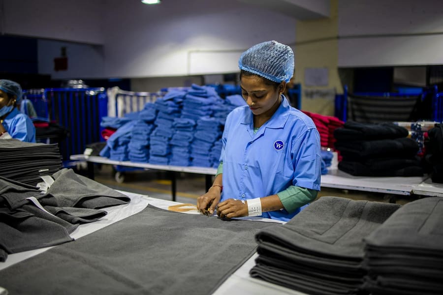 Cut T-shirt panels stacked by size