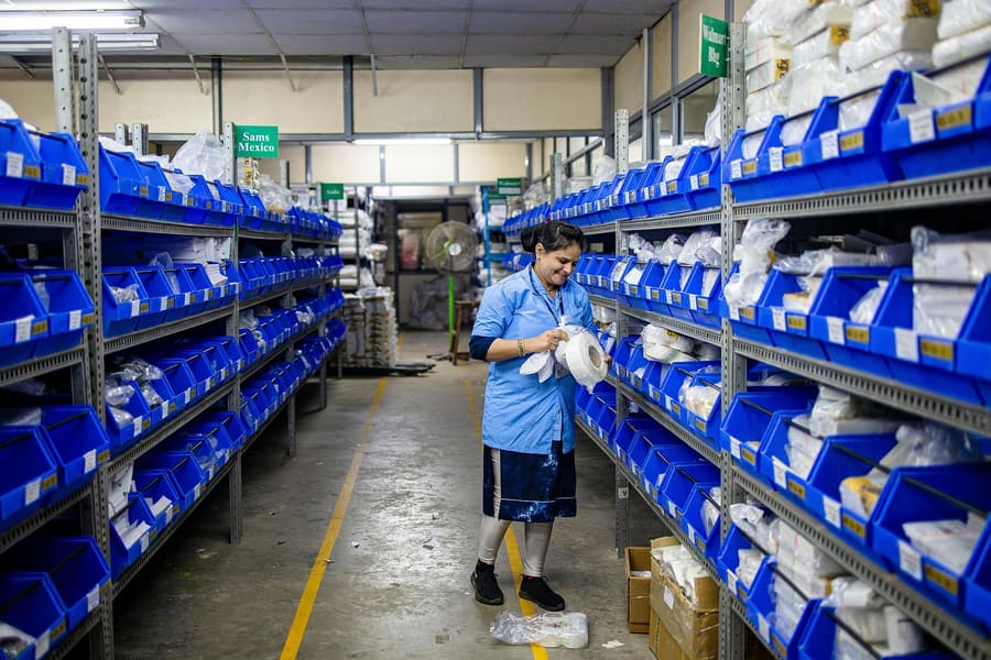 Packed orders on warehouse shelves